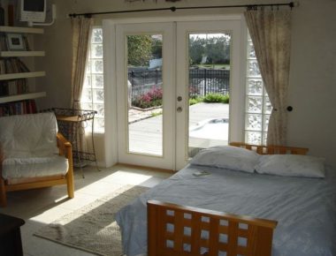 Third Bedroom Office with futon overlooking the Jacuzzi and bay